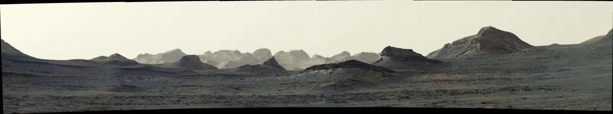 NASA’s Curiosity Captures Dawn Breaking on Wind-Carved Cliffs